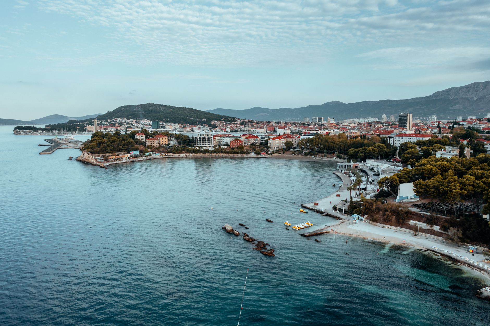Drone shot of Split's beautiful coastline, featuring a sceni