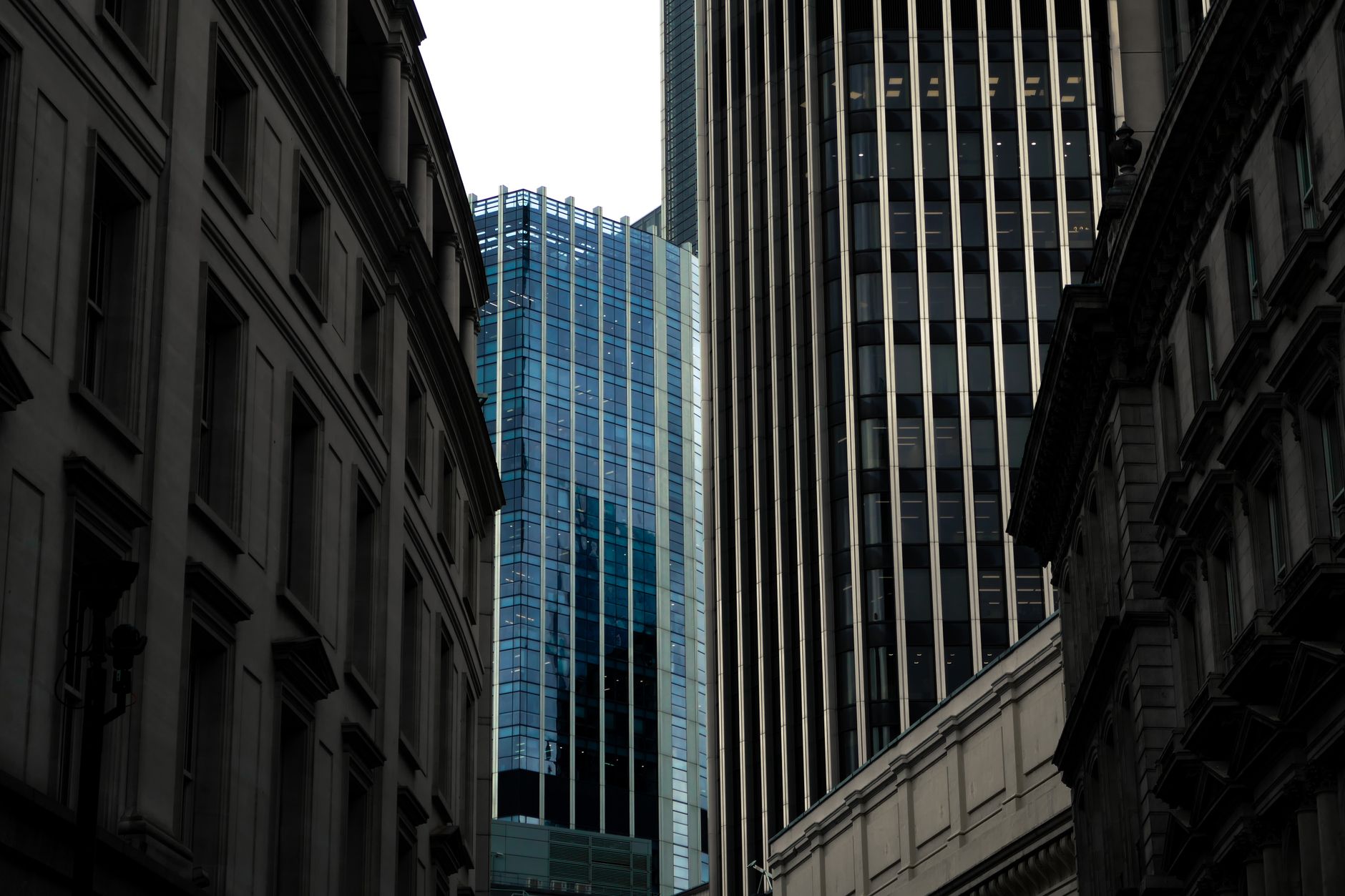 A view of modern skyscrapers with glass facades in an urban