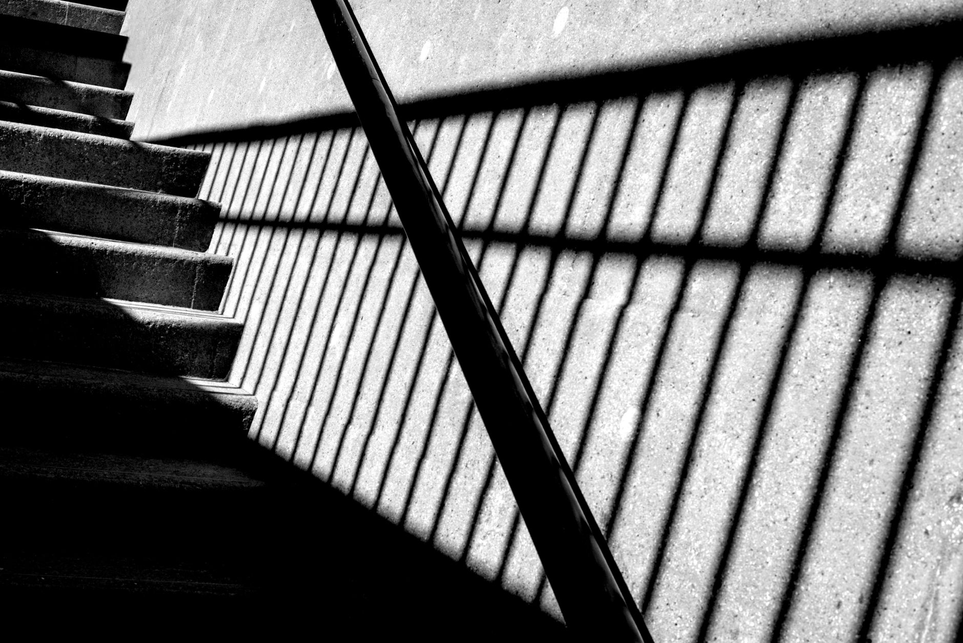 Intriguing shadows casting geometric patterns on a stairway