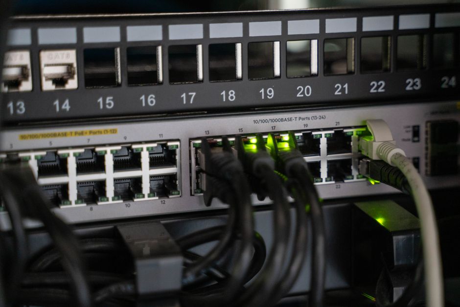 Networking equipment with connected cables, showcasing moder