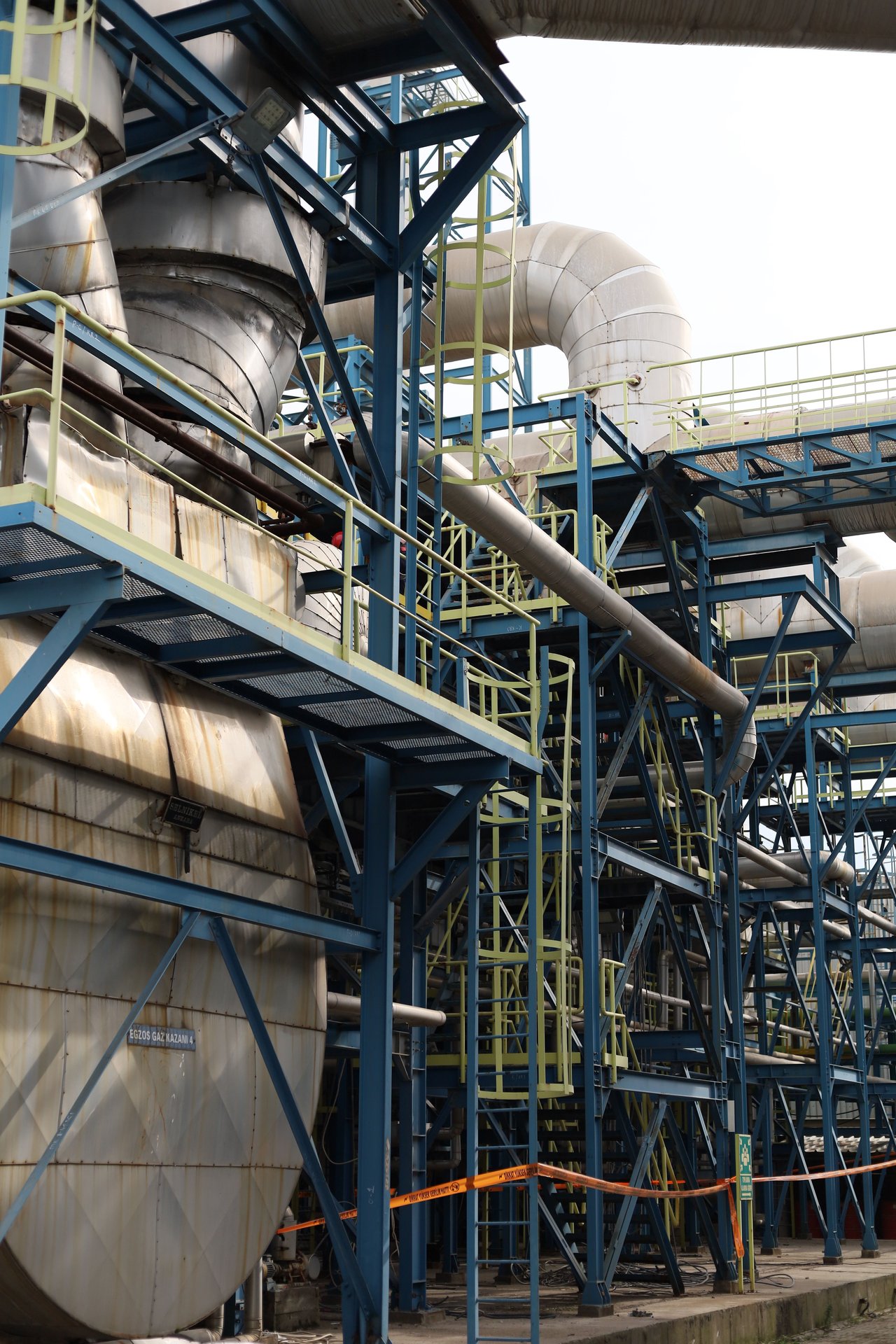 A detailed view of industrial structures and machinery at an