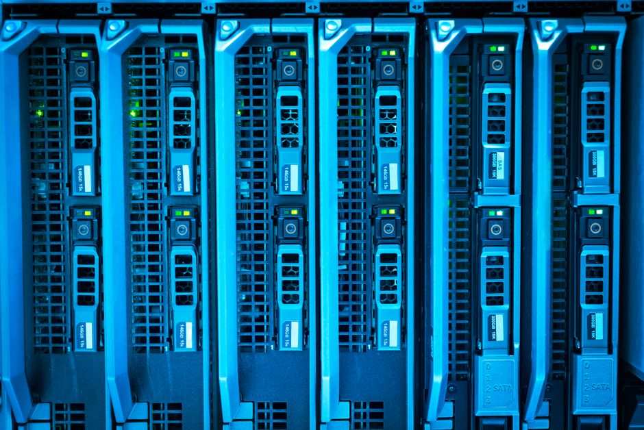 Detailed image of illuminated server racks showcasing modern