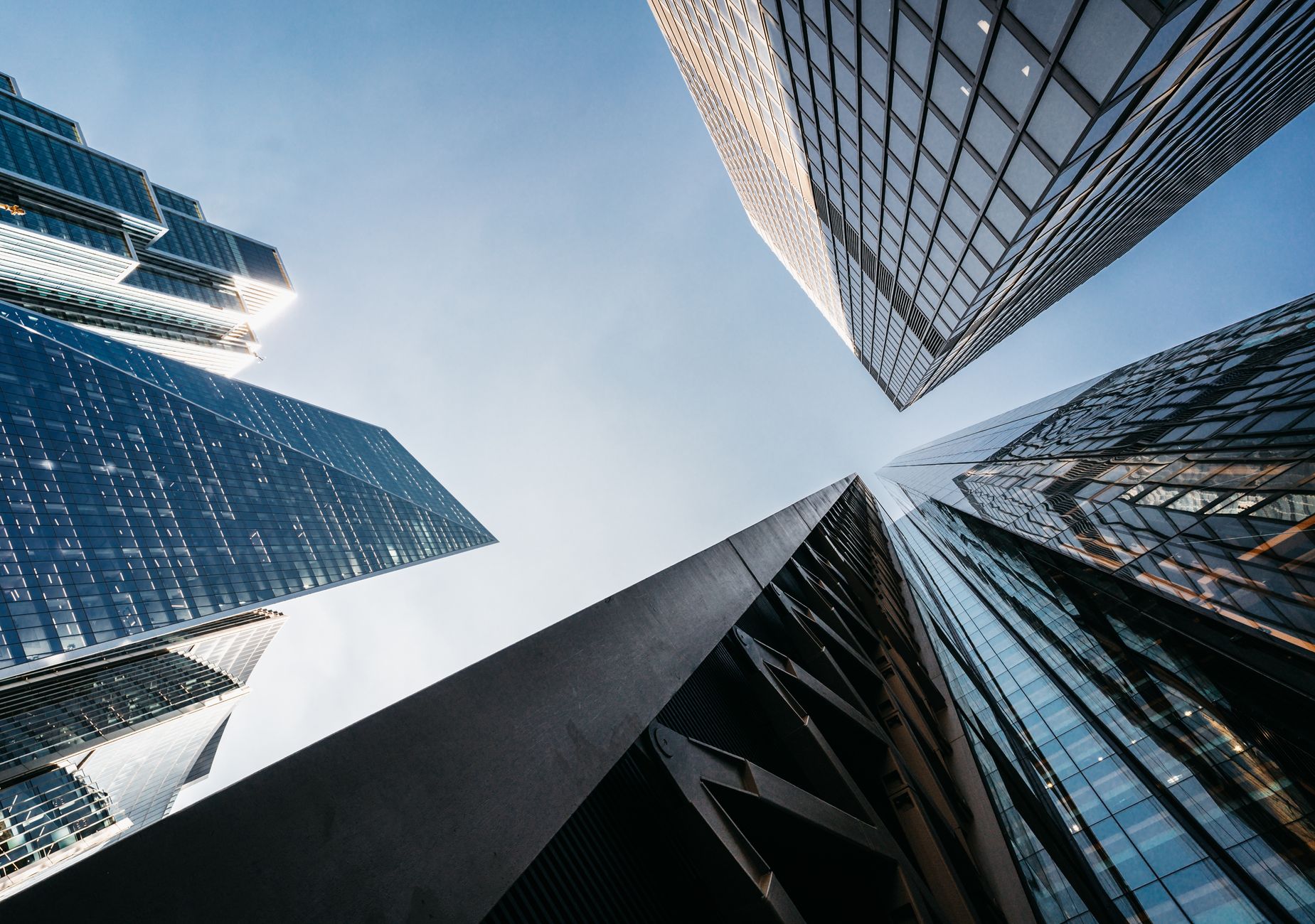 A striking upward view of modern skyscrapers in London's fin