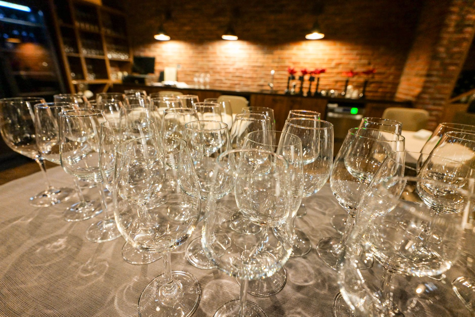 A stylish arrangement of wine glasses in a cozy bistro setti