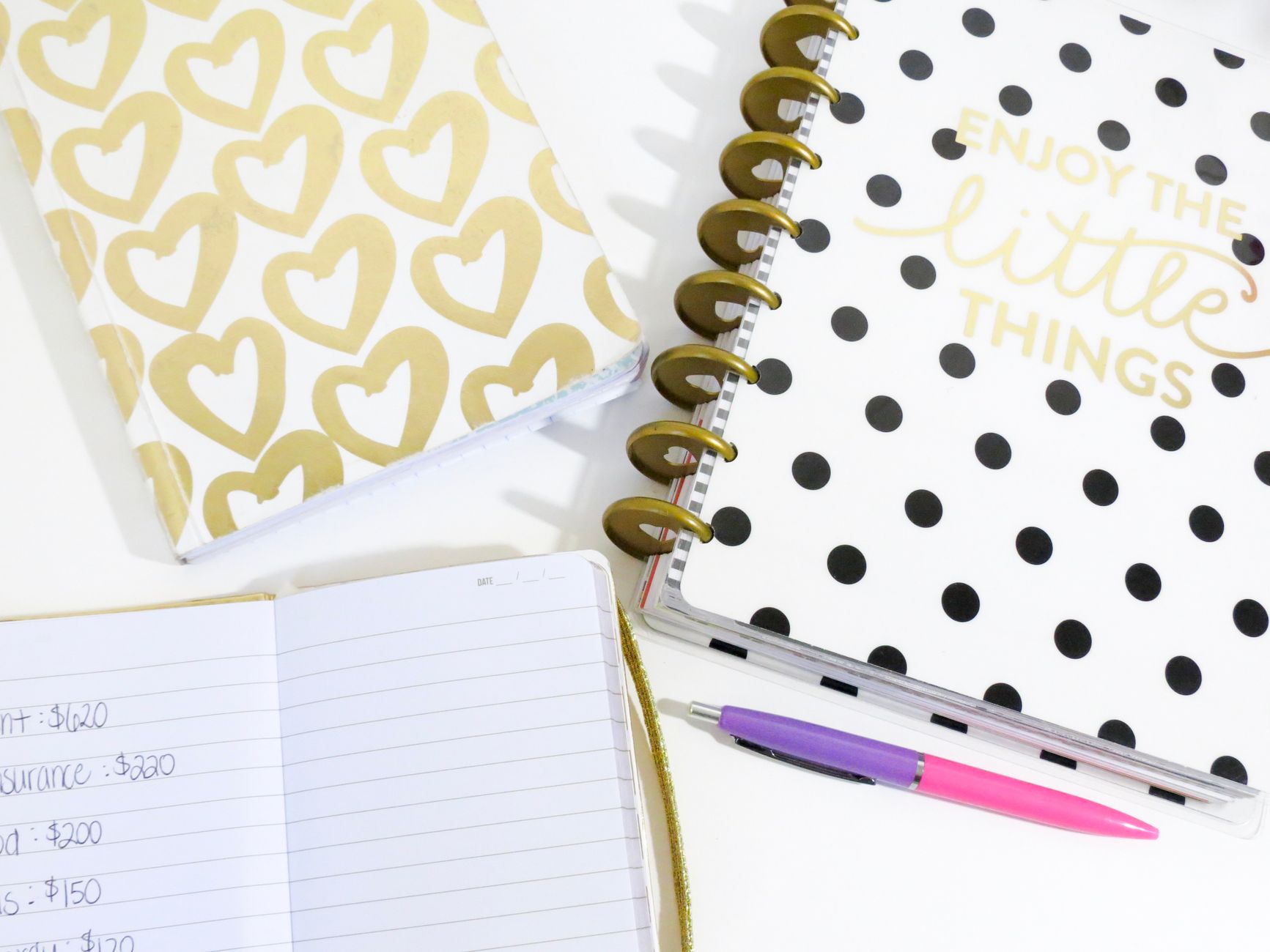 An arrangement of stylish notebooks with an inspirational quote, perfect for planning or journaling.