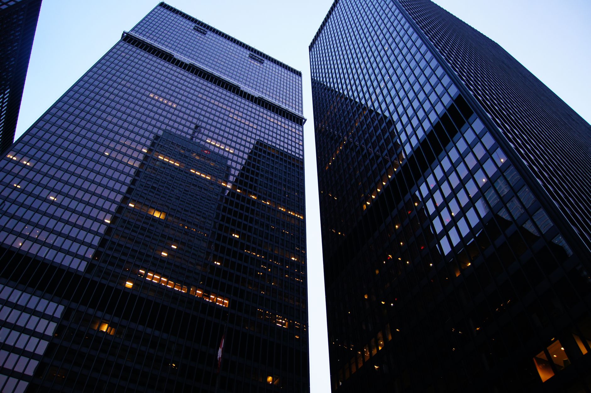 Dramatic low angle view of Toronto's skyscrapers reflecting