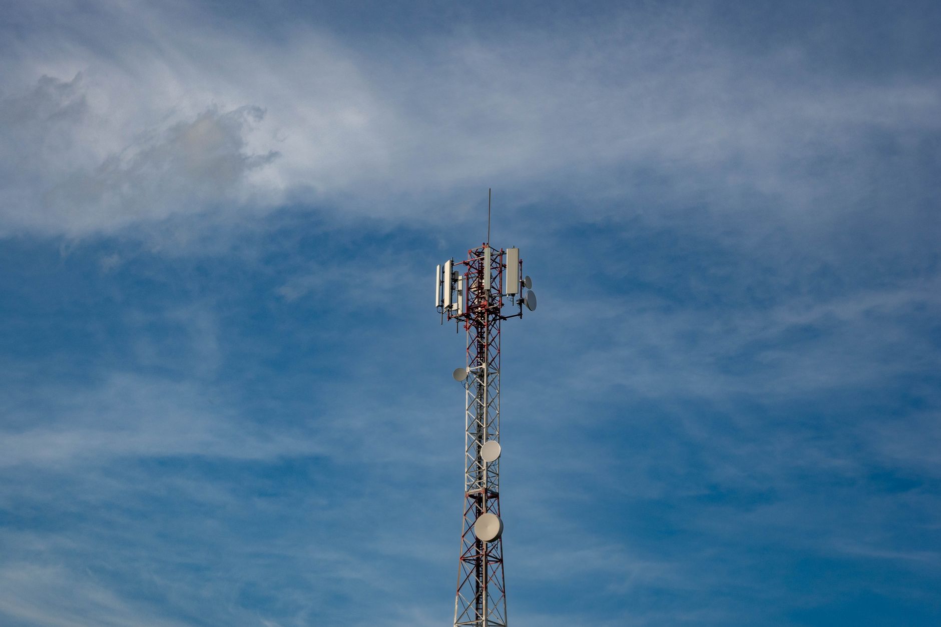 Telecommunications tower in Grubišno Polje against a blue sk