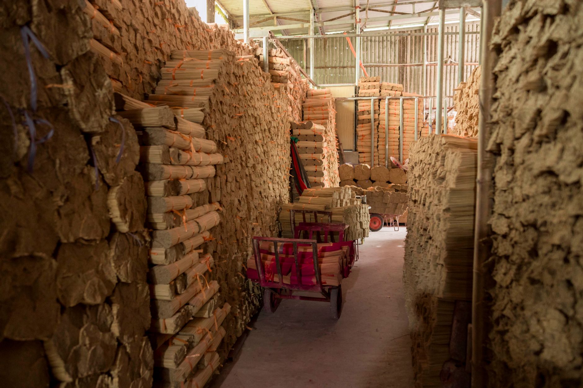 Interior view of a warehouse filled with neatly stacked card