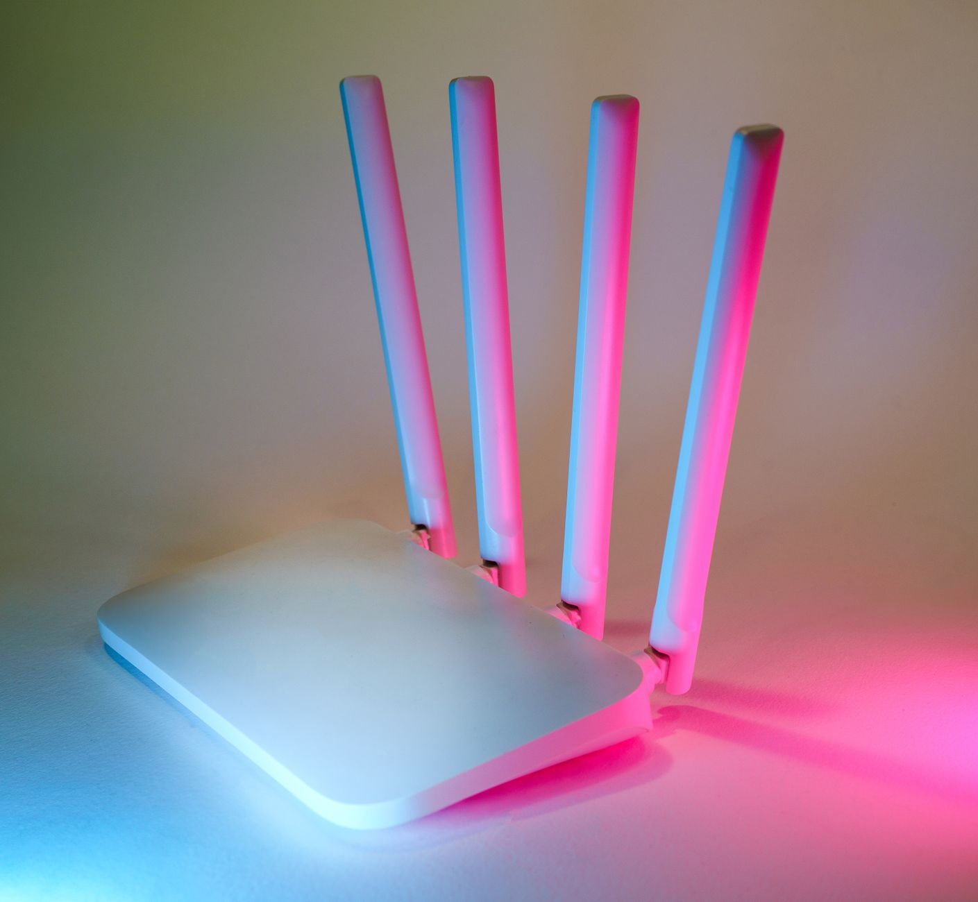 A sleek wireless router enhanced by vibrant neon lights, sho