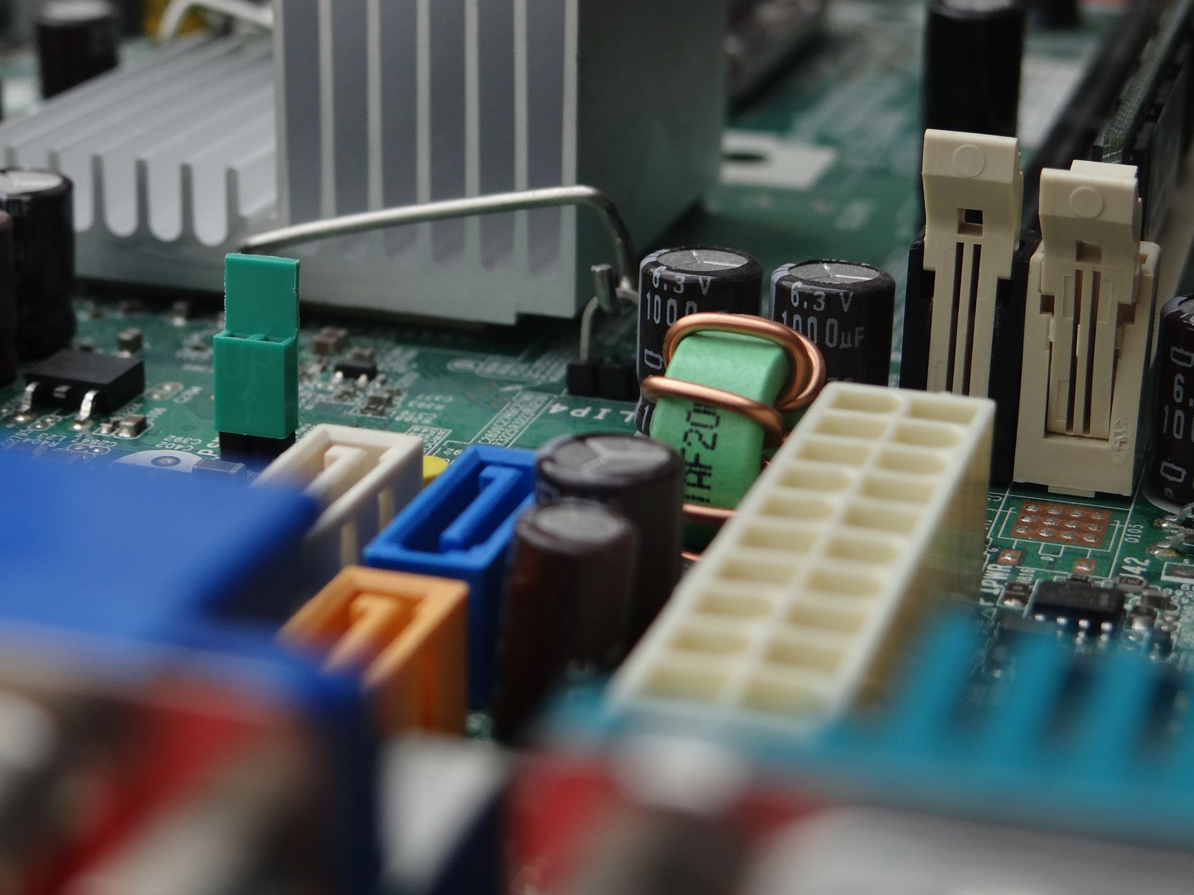 Detailed view of electronic components on a computer motherb