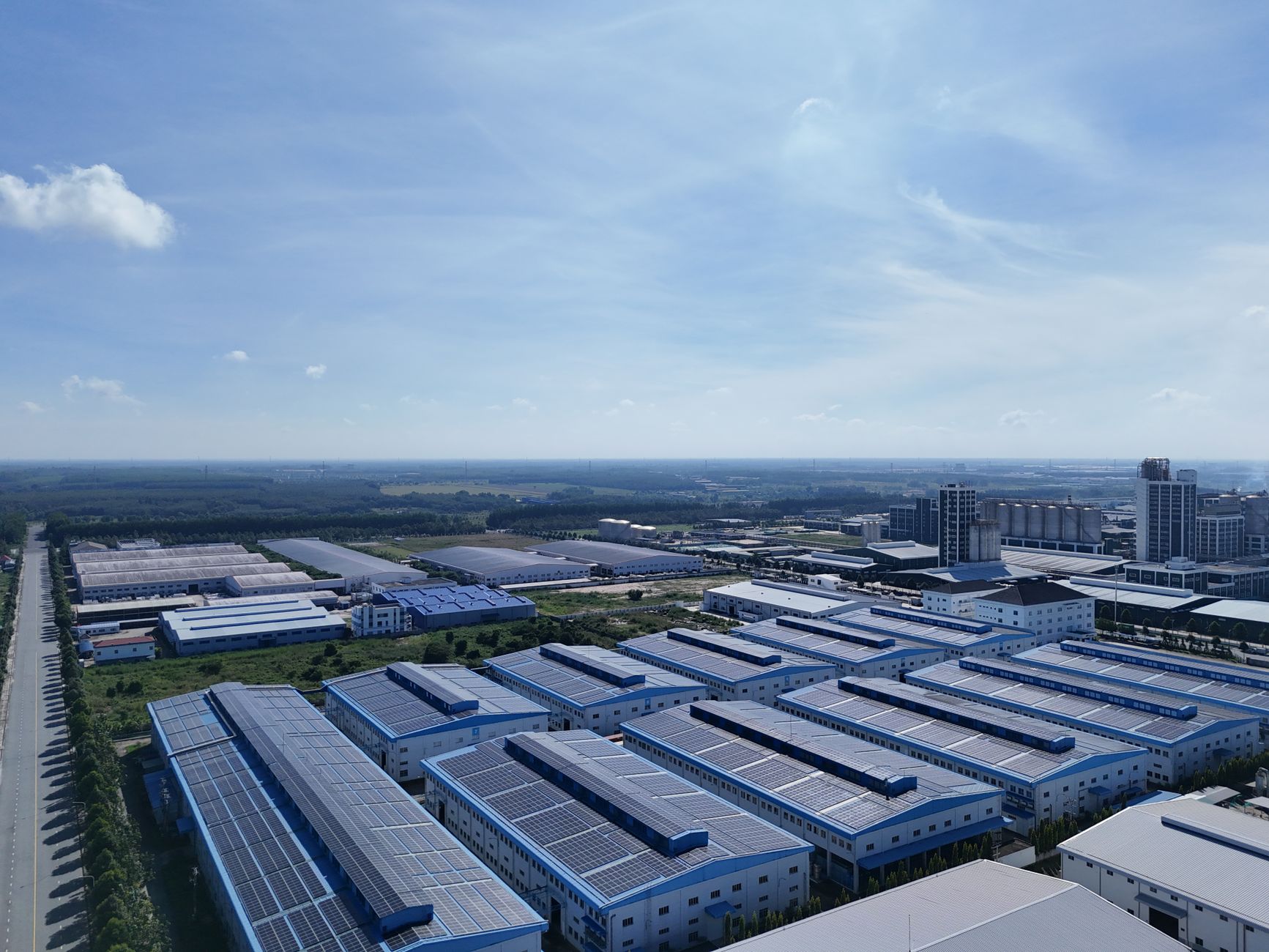 Aerial shot of a modern industrial park with warehouses in B