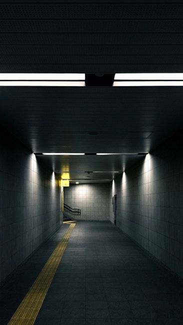 A moody, dimly lit subway tunnel in Ho Chi Minh City, Vietna