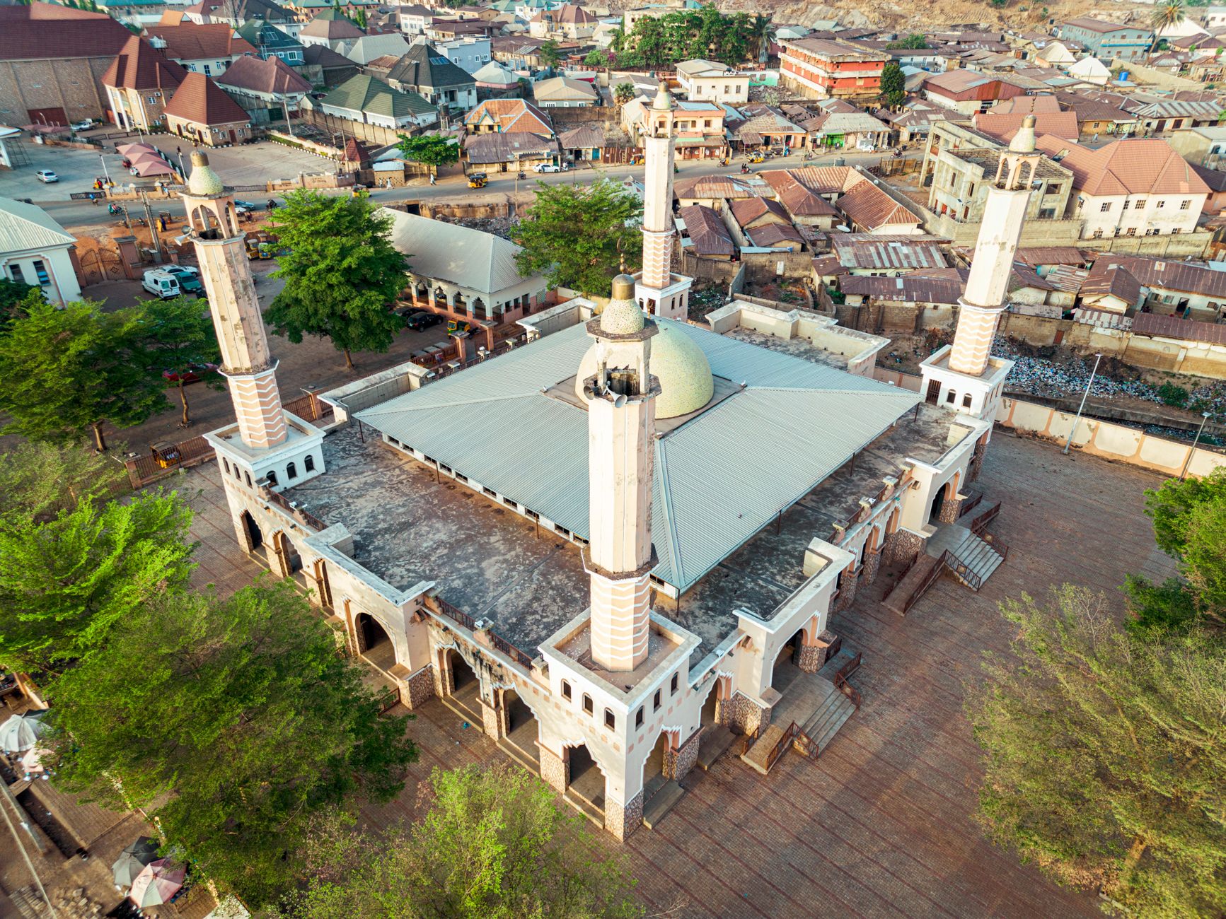 Stunning aerial view of a mosque in Kaduna, showcasing architectural beauty and surrounding area.