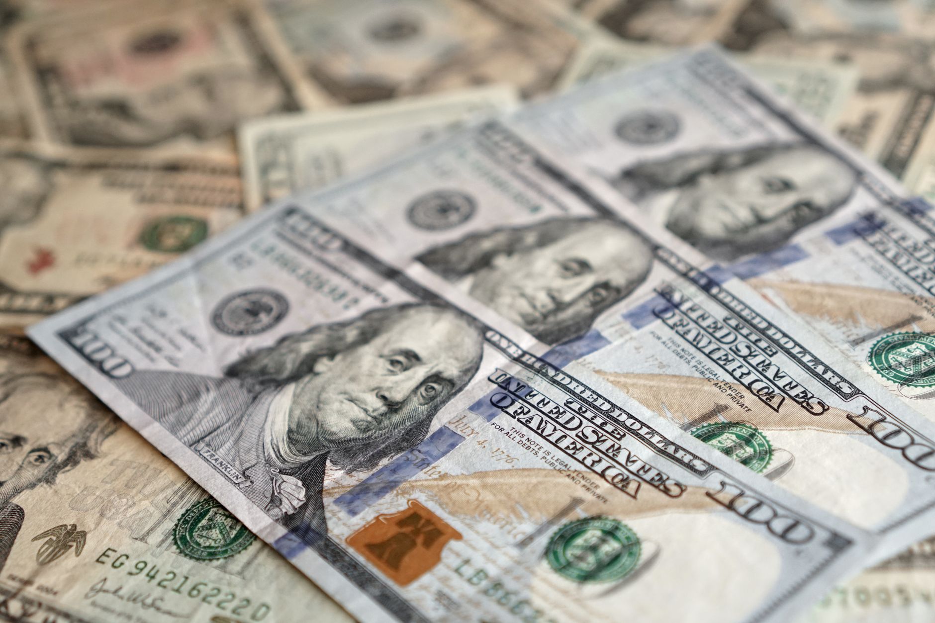 Detailed view of US dollar banknotes showcasing currency and