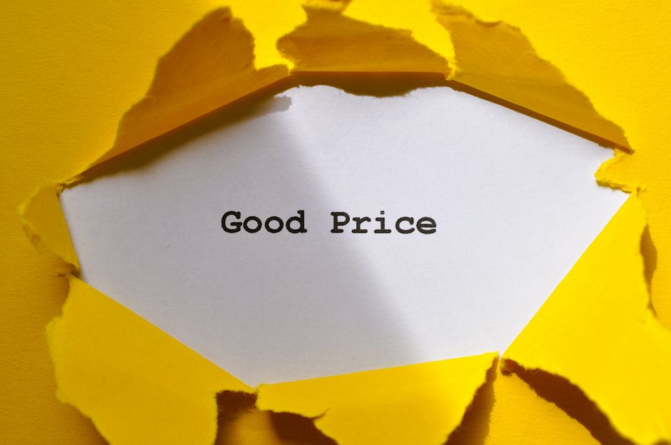 Yellow paper torn to reveal 'Good Price'. Perfect for sales