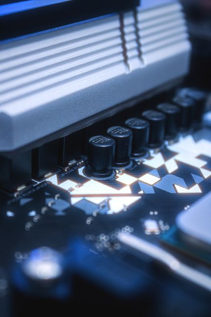 Detailed image of a circuit board featuring capacitors and i