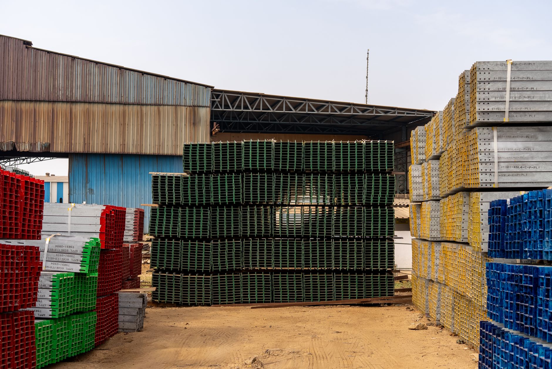 Colorful stacks of industrial materials organized in an outd
