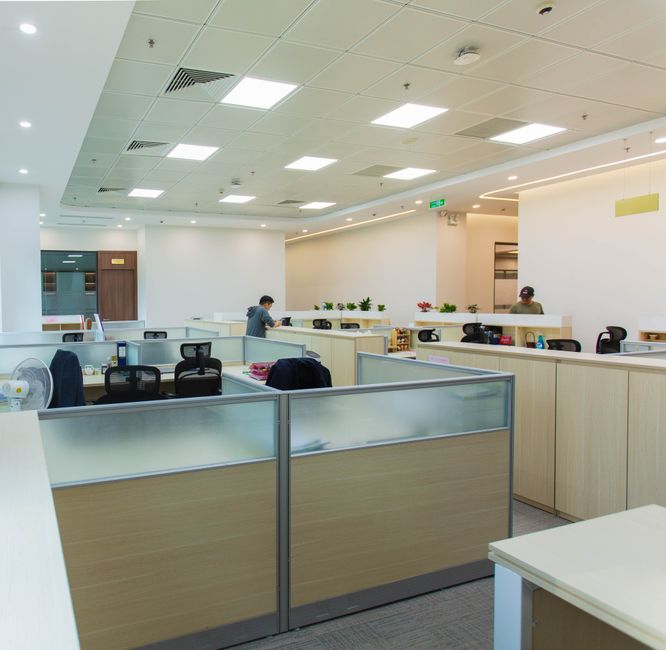 Spacious modern open office with workstations and natural li