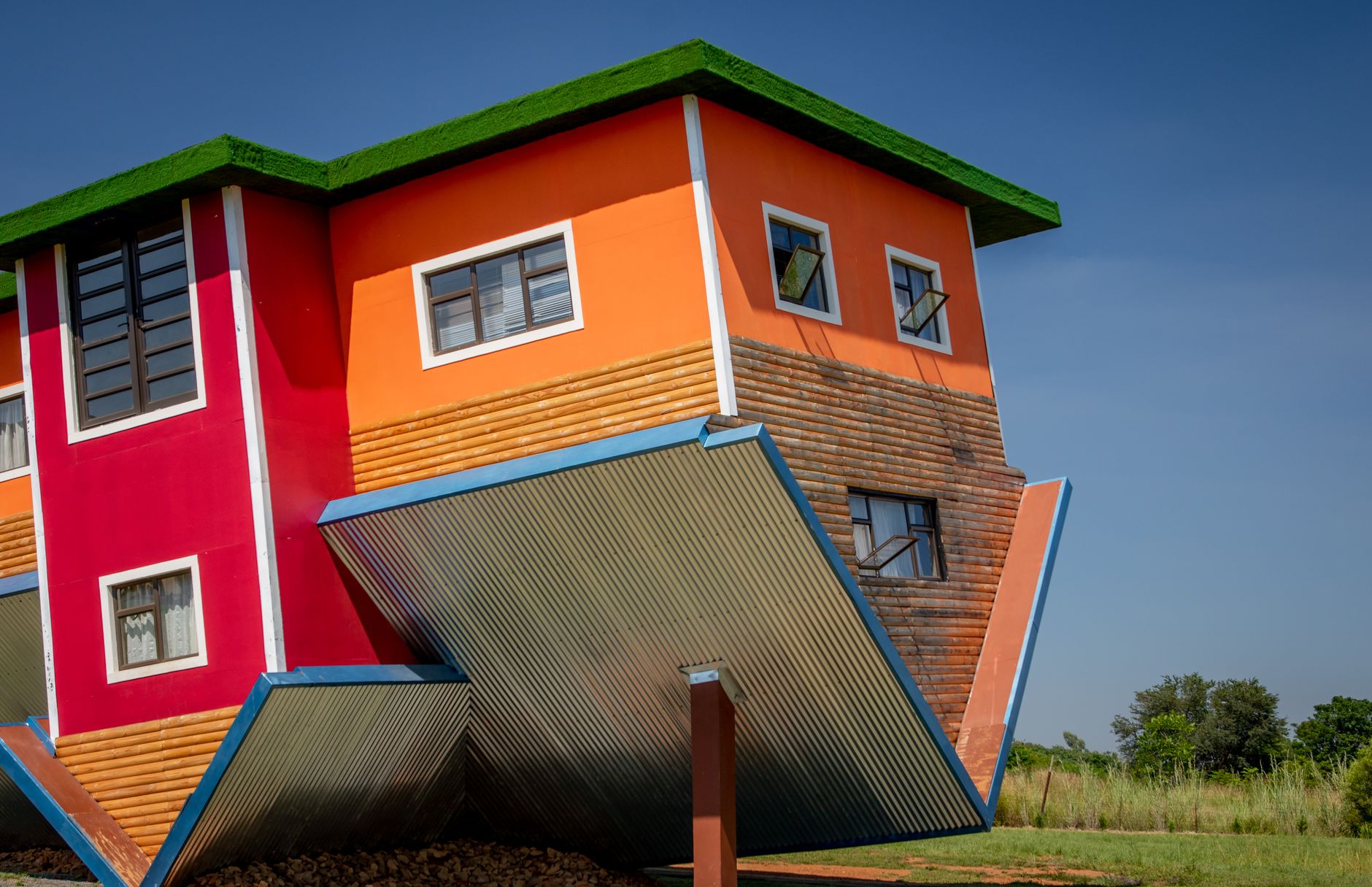 Colorful upside down house with a unique architectural desig
