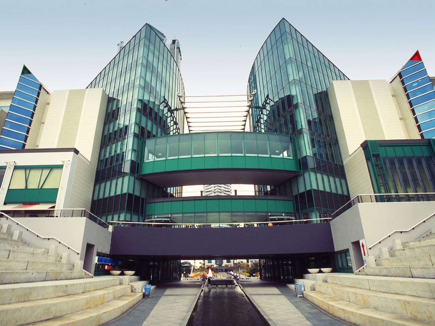 Contemporary building featuring a glass facade and innovativ