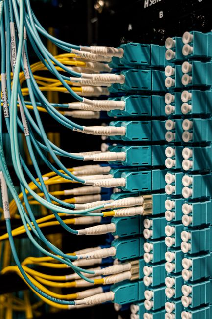 Similar colorful rubber cables with connectors in fiber opti