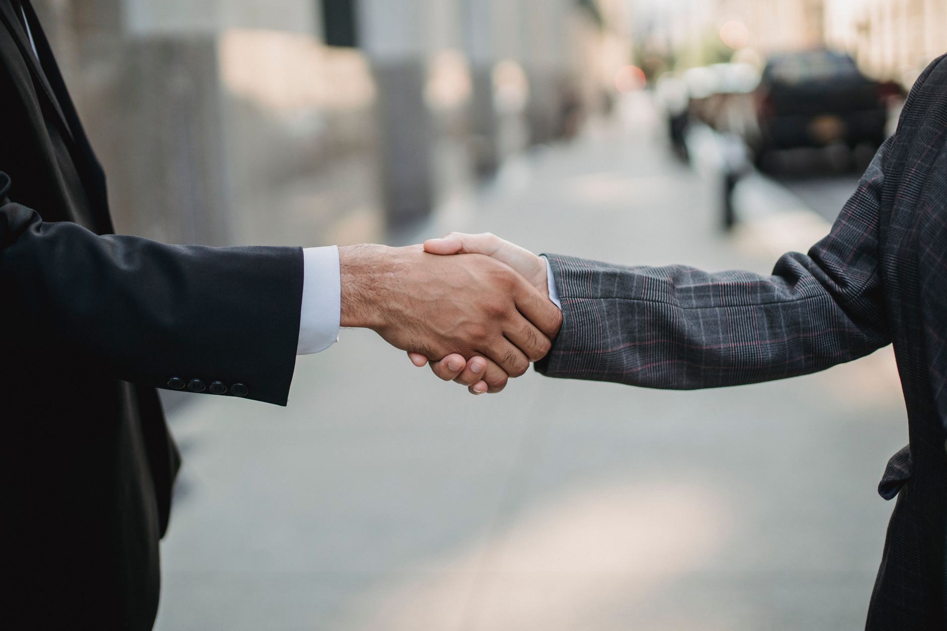Close-up of a business handshake between professionals outdo