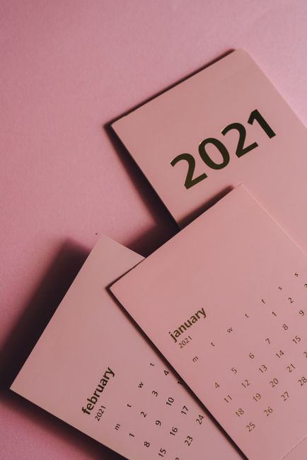 Top view of monthly calendars for 2021 year with numbers in