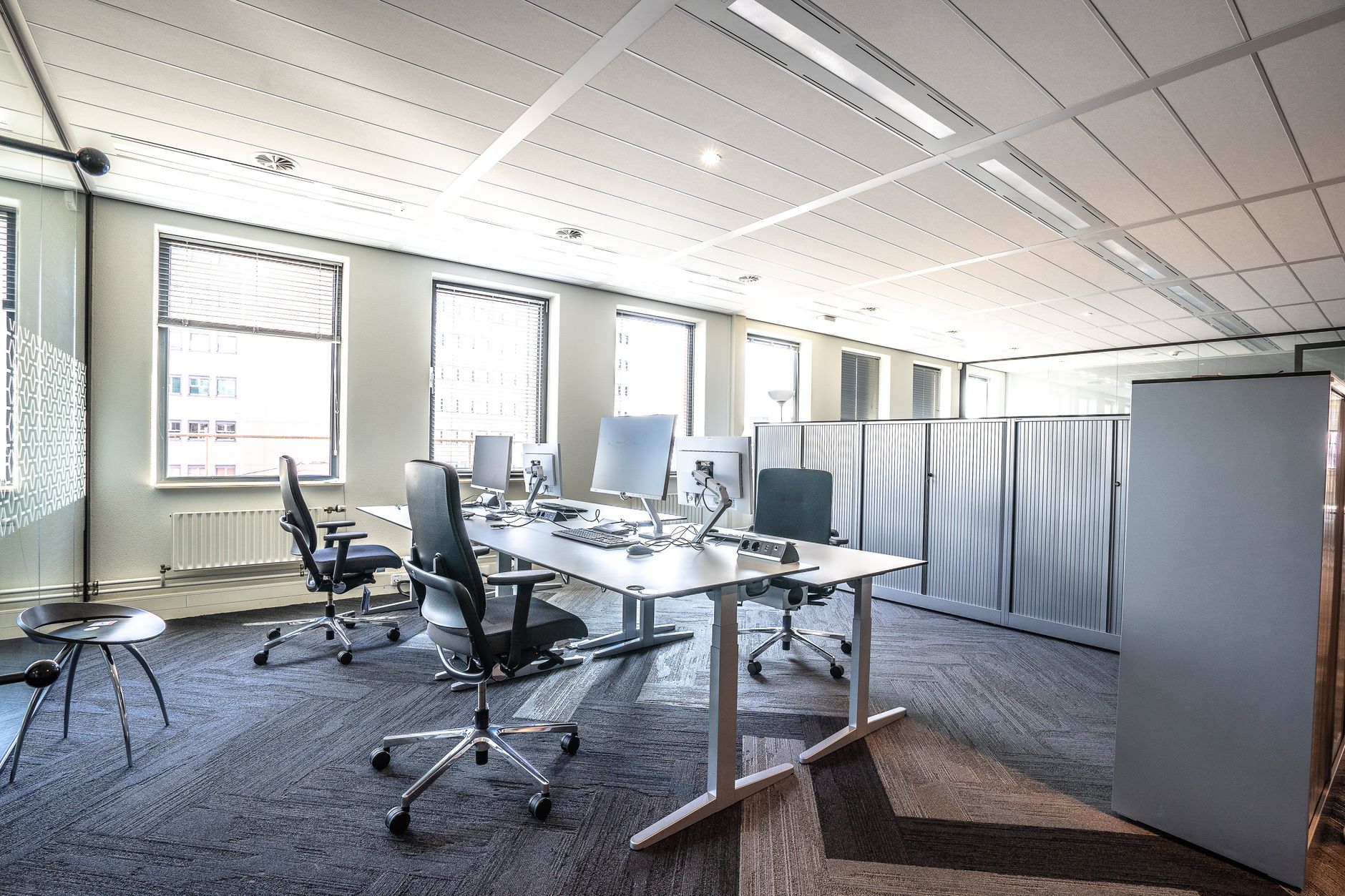 Bright and spacious modern office interior featuring sleek w