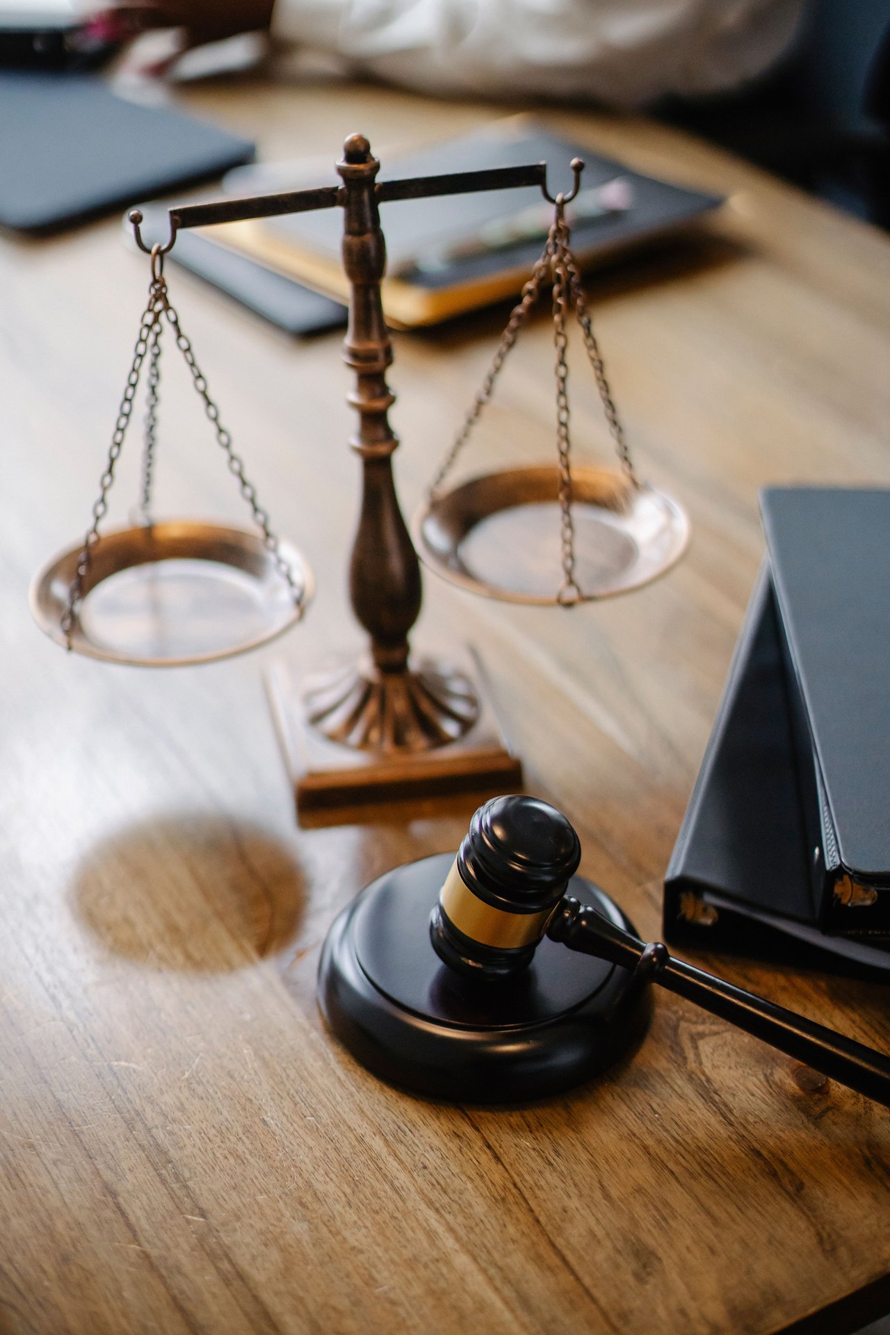 High angle lawyers desk with decorative judgement scales and
