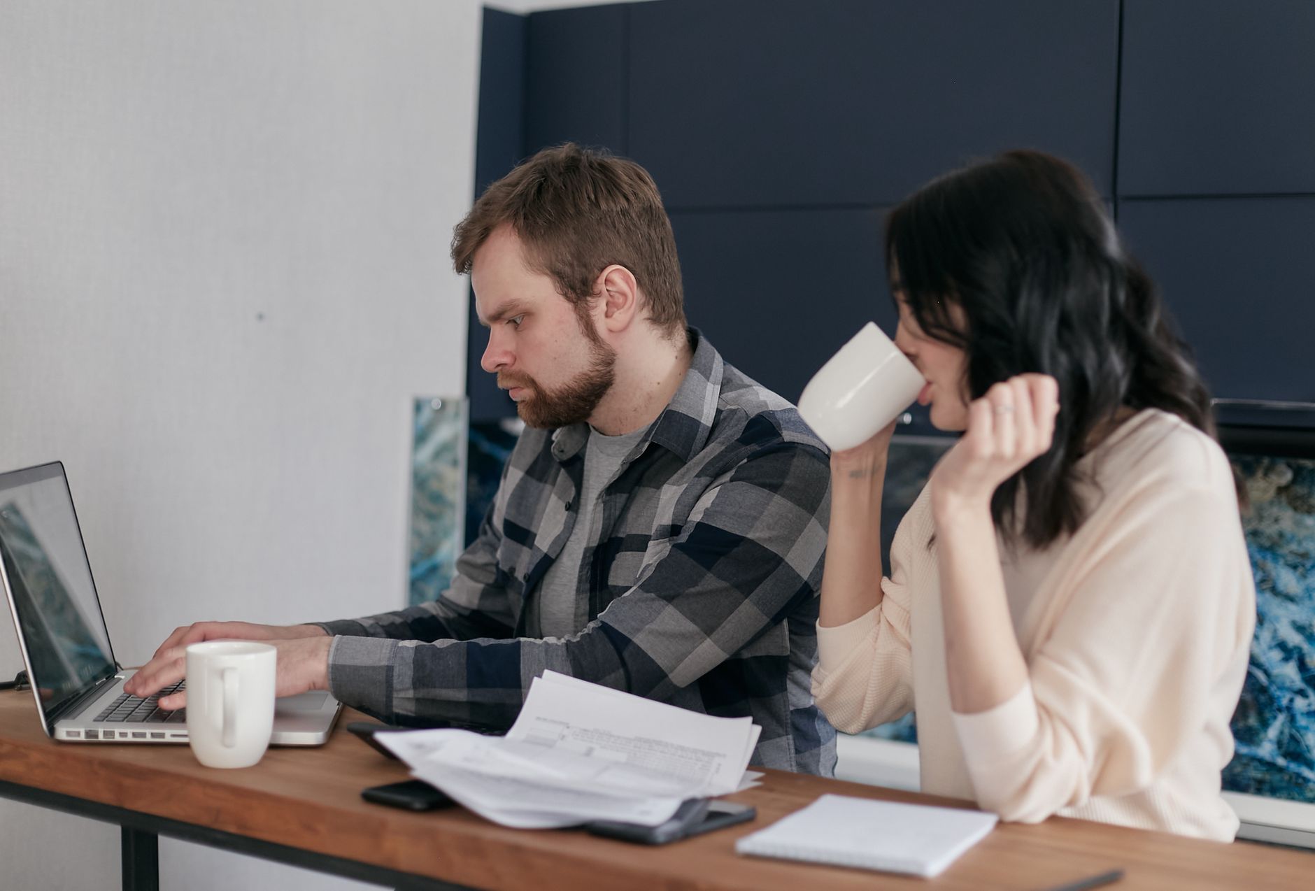 A couple at home, focusing on budgeting and finances with a