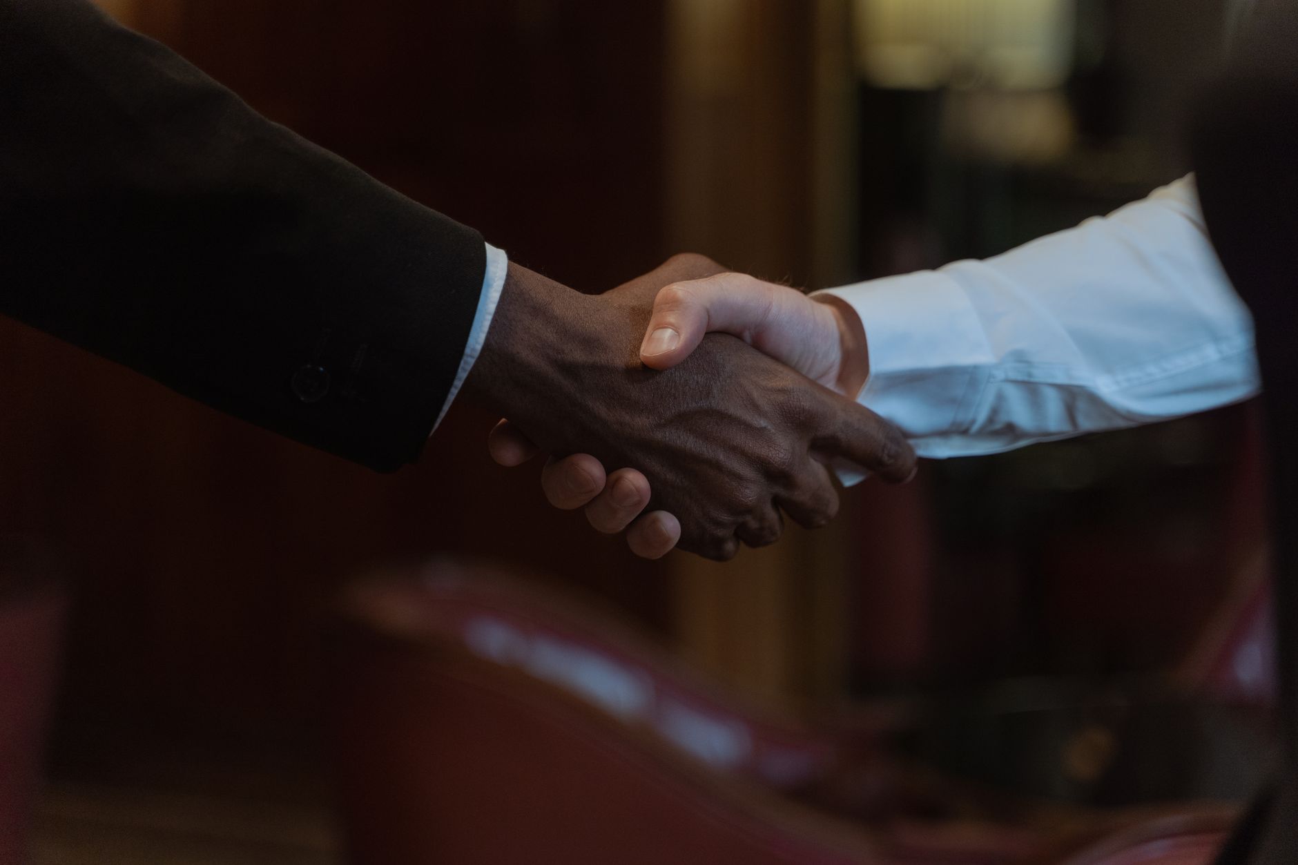 Close-up of a diverse handshake, representing business colla