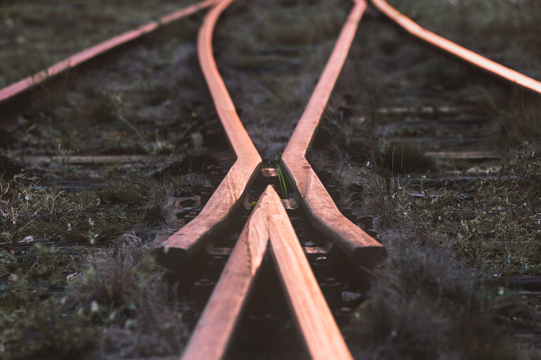 Close-up of rustic railway tracks intersecting in Norra Skar