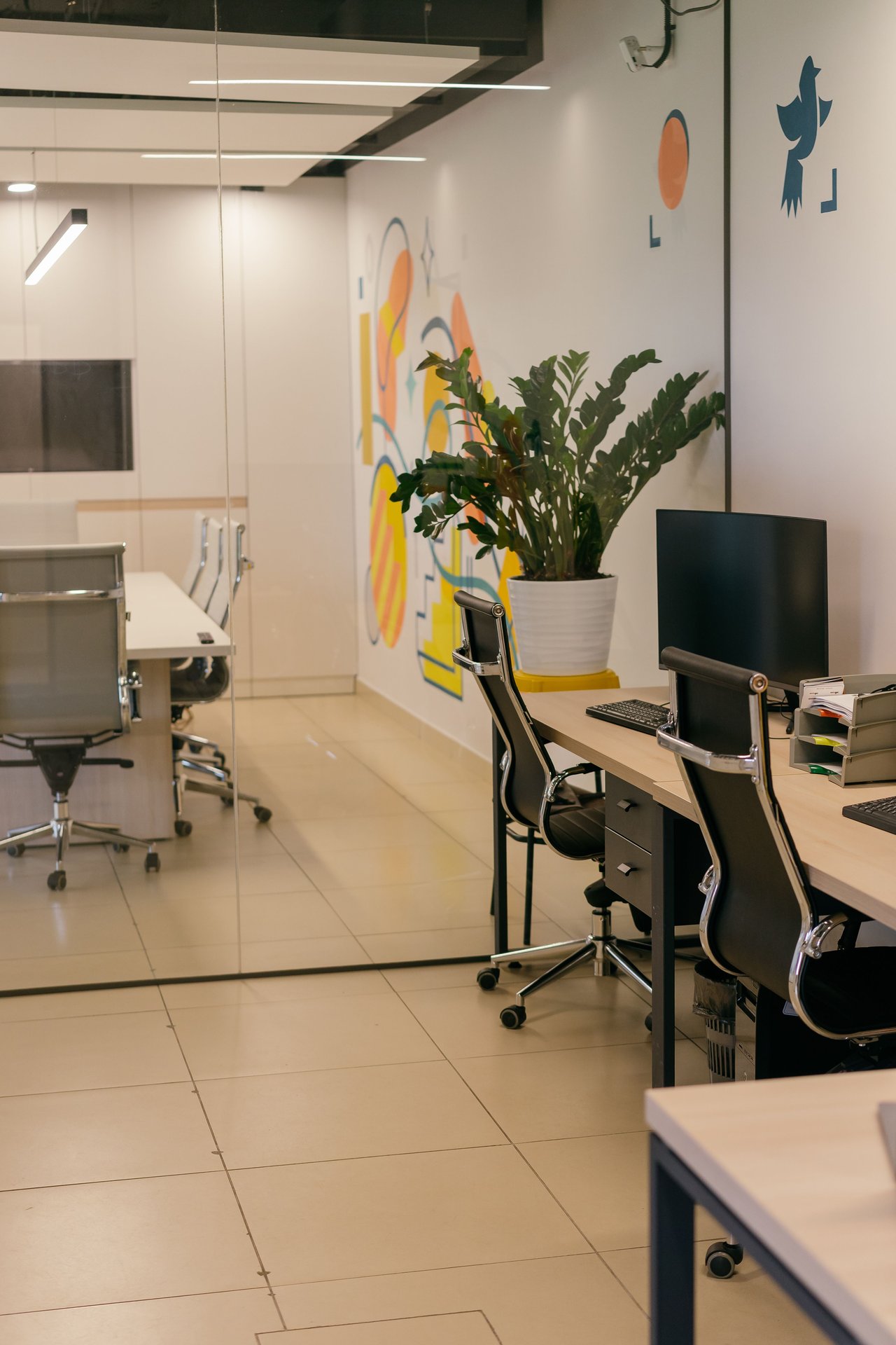 Spacious and contemporary office interior with glass partiti
