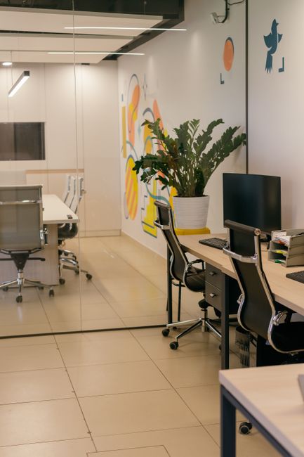 Spacious and contemporary office interior with glass partiti