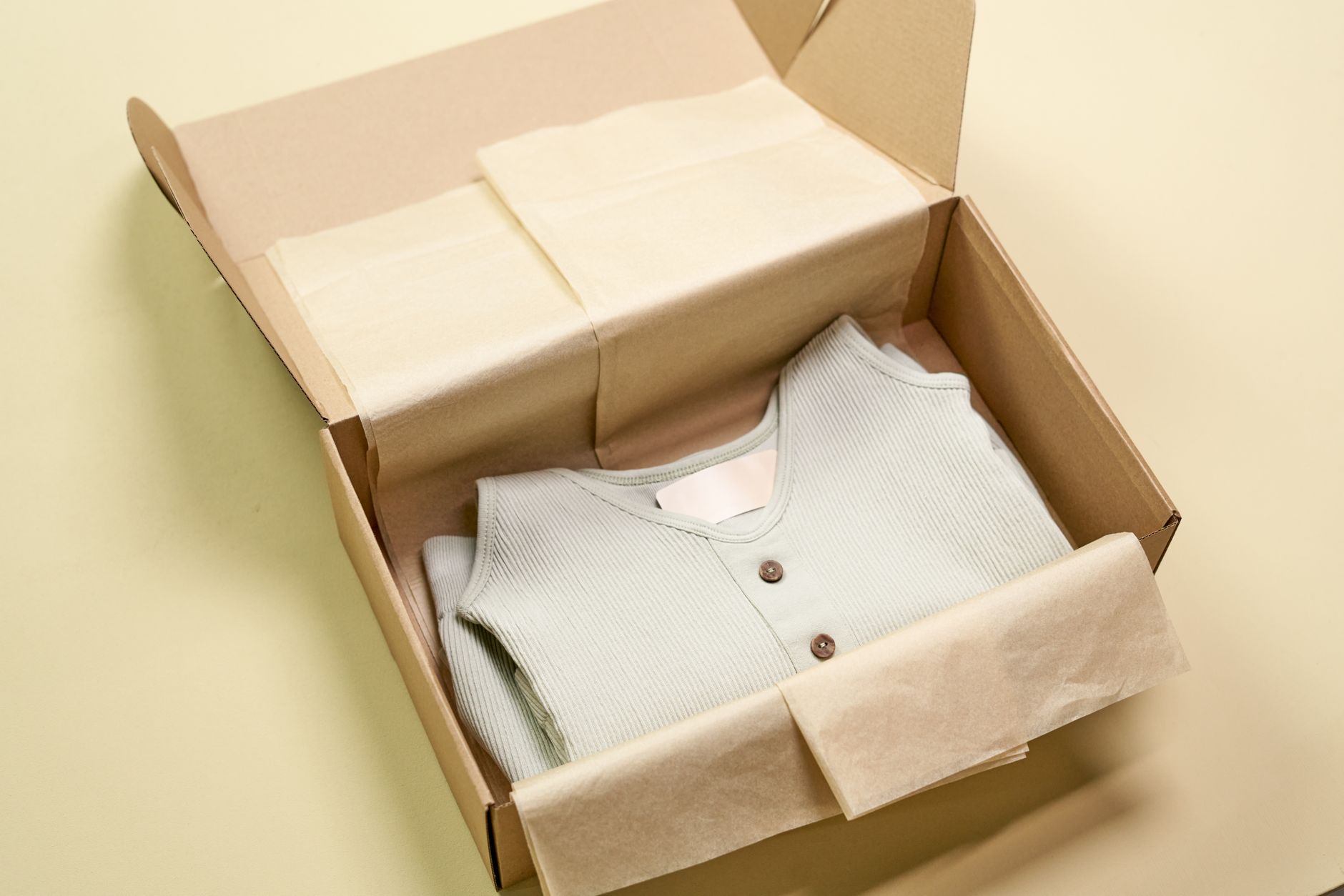 Sustainable wardrobe piece neatly packed in recyclable mater